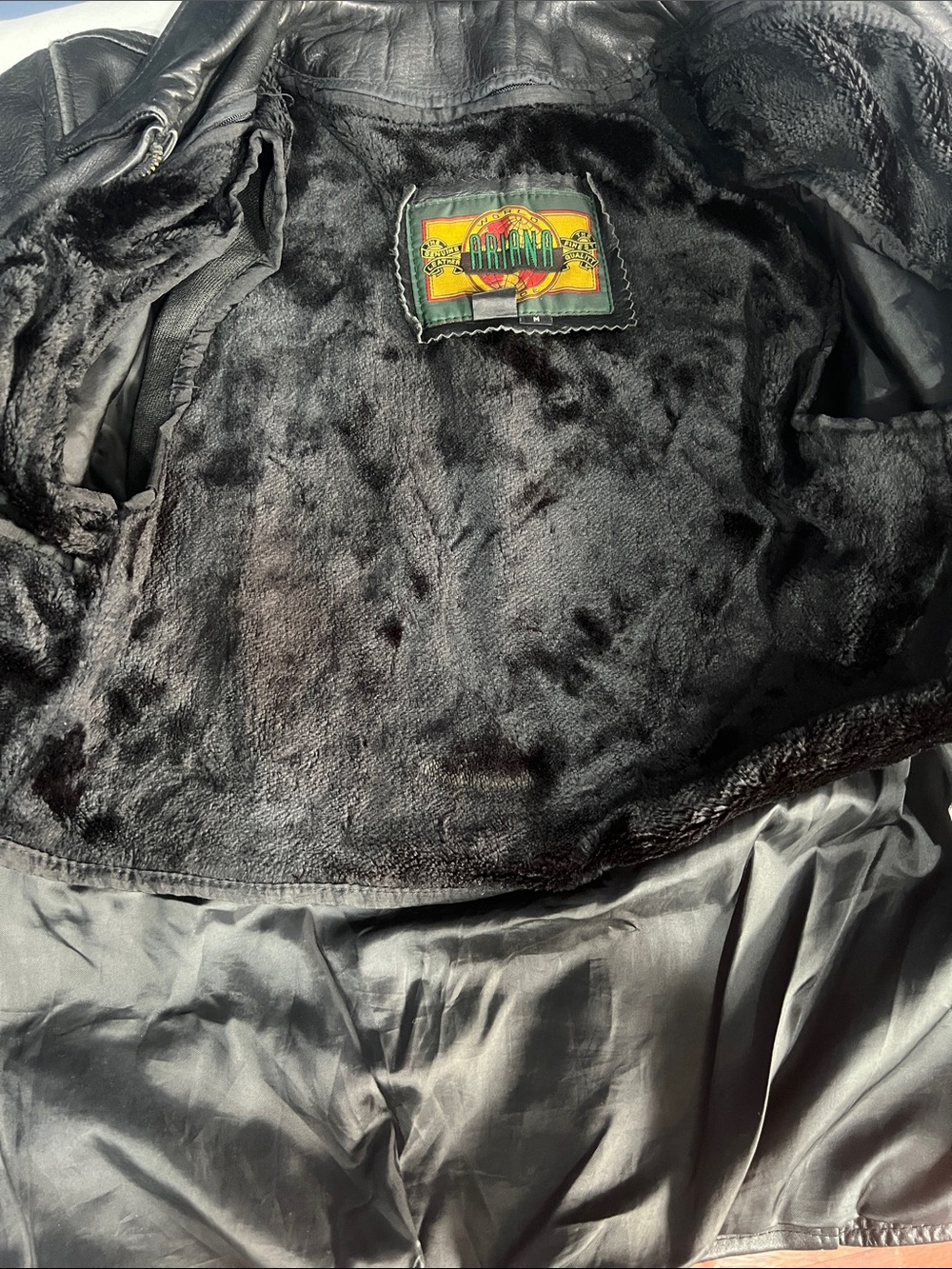 Black Faux Fur Lined Jacket with Branded Patch